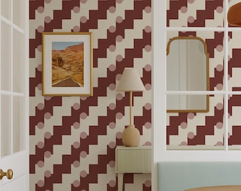 May include: Interior design featuring a dining area with a wooden table, a light blue bench, and a patterned wallpaper in burgundy and cream. A framed landscape art piece hangs on the wall, and a lamp sits on a side table.