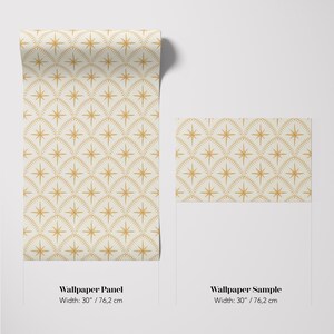May include: A wallpaper panel and a wallpaper sample, both featuring a repeating pattern of gold-colored four-pointed stars centered within dotted arch shapes on a cream background. Each item is labeled with a width of 30 inches.