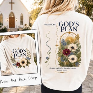Könnte beinhalten: Ein cremefarbenes Sweatshirt mit Rundhalsausschnitt und Grafikdesign. Auf der Rückseite steht der Text 'YOUR PLAN GOD'S PLAN' über einer bogenförmigen Blumenillustration mit Sonne und dem Text 'His ways reach higher than what I can see. ISAIAH 55:8-9'.
