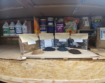Lombricompost organique, substrat de champignons usagé, biochar inoculé et charbon de bois pur.