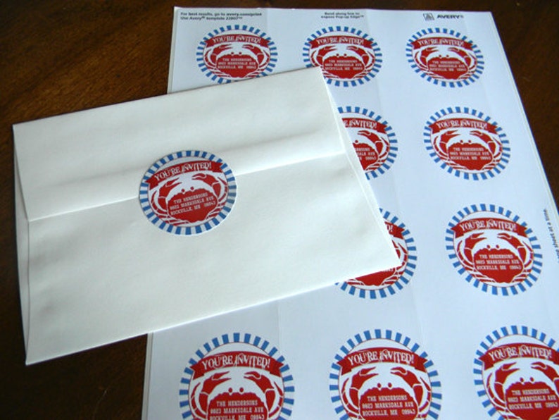May include: A sheet of red, white, and blue crab-themed stickers with the text "You're Invited!" and the words "The Henderson's 8623 Marksdale Ave Rockville, ME 0043" printed on each sticker.
