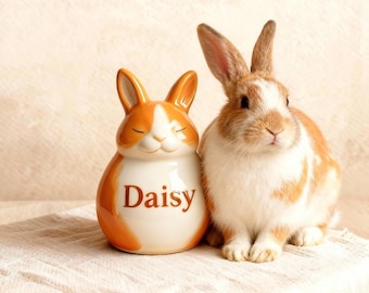 Urna de cerámica con forma de conejo para cenizas. Recipiente personalizado para recordar a tu mascota fallecida. Diseño único y exclusivo.