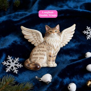 A personalised cat memorial ornament handmade in ceramic, featuring a custom hand-painted portrait of your beloved pet cat. Ideal remembrance or bereavement gift for Christmas tree decoration. Pet loss gift, cat memorial bauble, personalised photo ornament, handmade ceramic keepsake, remembrance gift for loved ones, custom pet memorial, in memory Christmas decoration for cat lovers.
