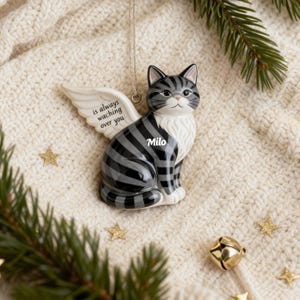 Cat memorial ornament size guide showing multiple handmade ceramic ornaments in various shapes and finishes. Personalised pet remembrance ornaments, pottery cat keepsakes, handmade memorial baubles for Christmas trees, sympathy gifts for pet loss, cat memorial photo decorations, pet bereavement ornaments, unique in memory ceramic keepsakes for cat owners.