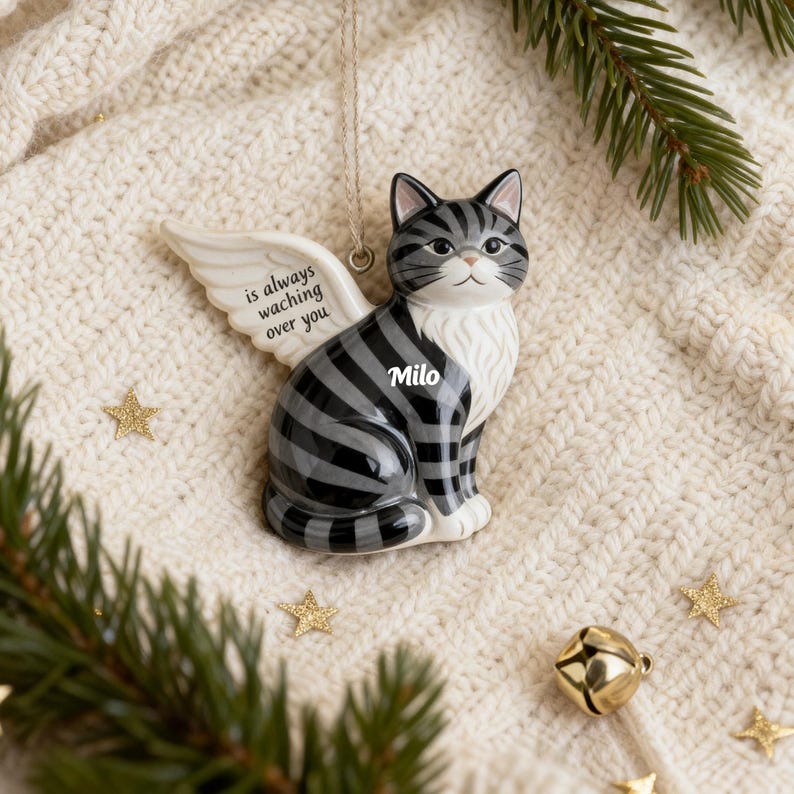 Cat memorial ornament size guide showing multiple handmade ceramic ornaments in various shapes and finishes. Personalised pet remembrance ornaments, pottery cat keepsakes, handmade memorial baubles for Christmas trees, sympathy gifts for pet loss, cat memorial photo decorations, pet bereavement ornaments, unique in memory ceramic keepsakes for cat owners.