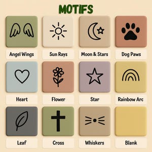 May include: A grid of twelve square tiles featuring the title MOTIFS at the top. Each tile displays a unique black icon including angel wings, sun rays, moon and stars, dog paws, heart, flower, star, rainbow arc, leaf, cross, whiskers, and one blank.
