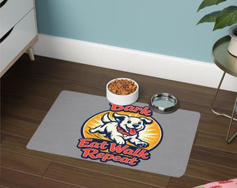 Alfombrilla antideslizante para comedero de perros Bark Eat Walk Repeat de 12x18 pulgadas.