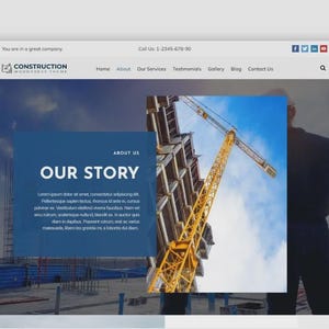 May include: Website design for a construction company. The site features a blue and white colour scheme, with a prominent image of a construction crane and a building under construction. The text "OUR STORY" is displayed.