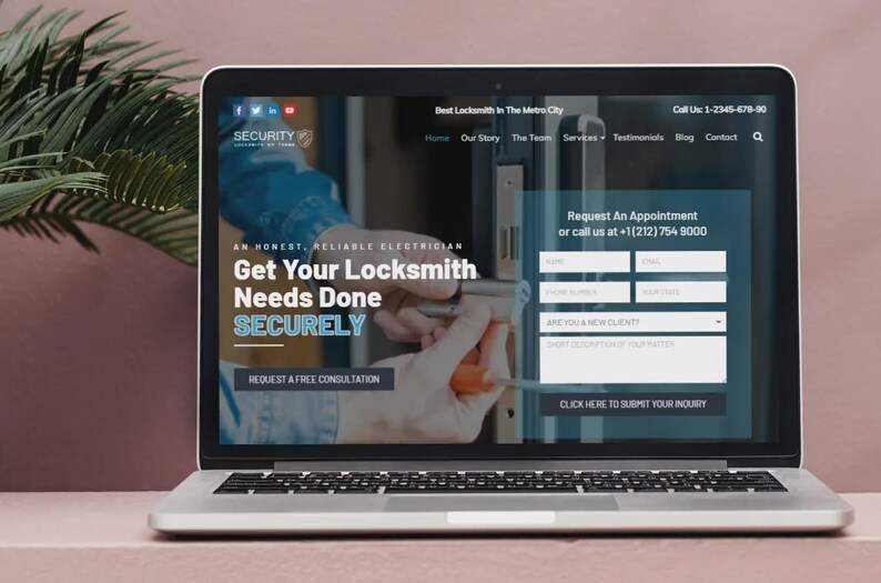 May include: A laptop displays a website for a locksmith service. The screen shows the text "Get Your Locksmith Needs Done SECURELY" and a form to request an appointment. The laptop is on a pink surface.