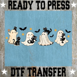 May include: A Halloween-themed DTF transfer design featuring cartoon ghosts and black cats on a blue background. The ghosts are white with black eyes, and the cats are black. The design includes bats and stars, with the text "READY TO PRESS" and "DTF TRANSFER".