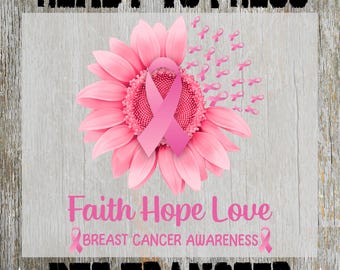 May include: A pink sunflower design with a pink ribbon in the center, surrounded by smaller pink ribbons. The words "Faith Hope Love" and "Breast Cancer Awareness" are displayed in pink text. The words "READY TO PRESS" and "DTF TRANSFER" are in black text.