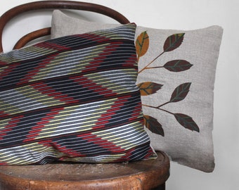 Set of two decorative pillow covers. Screen printed leaves on natural linen and Vintage kimono ikat in autumn colours