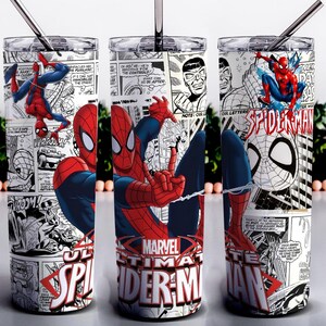 May include: Three cylindrical tumblers with metal straws, featuring a black and white comic book print background with red and blue Spider-Man illustrations. The text Marvel Ultimate Spider-Man is printed in red and white at the base of each cup.