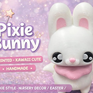 May include: A white 3D-printed Pixie Bunny figurine with large black eyes, pink accents, and small wings. The bunny wears a pink scarf and is handmade. The image includes the text "Pixie Bunny", "3D PRINTED - KAWAII CUTE", and "HANDMADE".