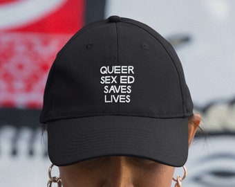 Queer Sex Ed Saves Lives hat | LGBTQ+ trans feminist sex education organic cotton baseball cap