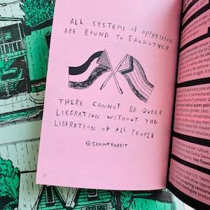 May include: Pink background with black text that reads "ALL SYSTEMS OF OPPRESSION ARE BOUND TO EACH OTHER."  Below the text are two crossed flags, one black and white and the other rainbow.  The text continues below the flags, "THERE CANNOT BE QUEER LIBERATION WITHOUT THE LIBERATION OF ALL PEOPLE."  The text "@SAMMYRABBIT" is at the bottom of the page.