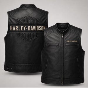 May include: A black leather vest featuring a front zipper closure, two chest pockets, and two lower pockets. The back displays an embossed Harley-Davidson Motor Cycles logo with the text Harley-Davidson, and a small logo patch on the front chest.