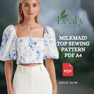 Puede incluir: Top blanco de estilo campesino con estampado floral azul y mangas abullonadas. La imagen también incluye el texto "Leafy Patterns" y "Milkmaid Top Sewing Pattern PDF A4". También es visible un icono PDF rojo.