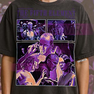 May include: Dark gray t-shirt featuring a graphic from the movie "The Fifth Element." The design includes multiple panels with images of characters and scenes from the film, with the movie title in purple text at the top.