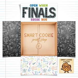 May include: An open cardboard box with the text "OPEN WHEN FINALS BREAK YOU" in blue, green, and black. The box interior features the text "SMART COOKIE print shop". The box sides are decorated with school-themed doodles on a chalkboard background.