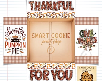 May include: An open cardboard box with Thanksgiving-themed designs. The box features the words "THANKFUL" and "FOR YOU" in a fall leaf pattern. The sides display "Sweeter Than Pumpkin Pie" and "Give Thanks" graphics.