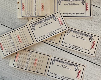May include: Several vintage prescription check stubs with the text "PRESCRIPTION DEPARTMENT" and the phrase "Our Service Merits Your Patronage." Each stub has a unique number in red ink and lines for information.