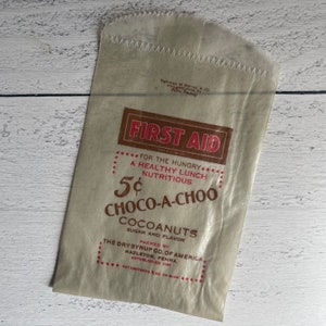 Vintage 5 Cent Chocolate-A-Choo Cocoannuts Erste Hilfe Pergamin-Leckerli Tasche
