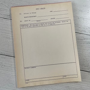 May include: A vintage audit inquiry form with the title "AUDIT INQUIRY" at the top. The form is tan with black text and red trim. It includes sections for "Officer in Charge," "Branch/Department," and "Audit On." The bottom has space for comments and signatures.