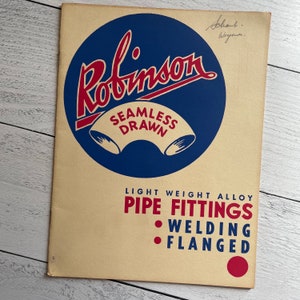 May include: An aged paper advertisement for Robinson pipe fittings. The design features a large blue circle with the name "Robinson" in red script. Below, it reads "SEAMLESS DRAWN" and lists "PIPE FITTINGS".