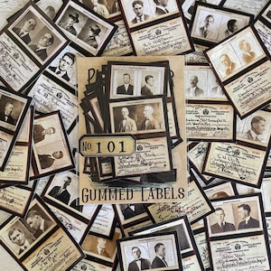 Op de afbeelding: Een verzameling vintage gummed labels met zwart-wit foto's van mannen. De labels bevatten het woord "PHOTOGRAPH" en handgeschreven tekst. Een centraal label leest "No. 101" en "GUMMED LABELS".