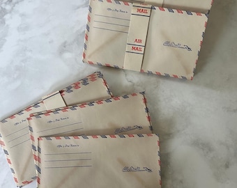 ¡Sobres antiguos de correo aéreo! Elija un juego completo de 20 sobres con su faja original o un solo sobre de un paquete ya abierto.