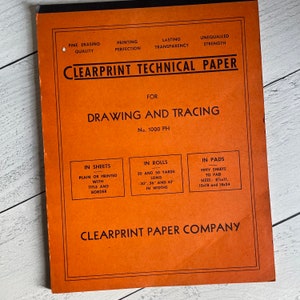 Könnte beinhalten: Ein orangefarbener Block Clearprint Technical Paper zum Zeichnen und Pauschen. Das Cover enthält Text wie "Fine Erasing Quality" und "Drawing and Tracing". Der Block ist in Blättern, Rollen und Blöcken erhältlich. Größen sind 21,6x27,9, 30,5x45,7 und 45,7x61 cm.