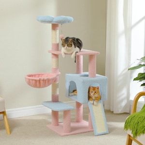 May include: A pastel pink and blue cat tree with multiple levels. It includes a hanging basket, scratching posts, a cubby, and a ramp. Two cats are seen using the structure. The cat furniture is designed for indoor use.
