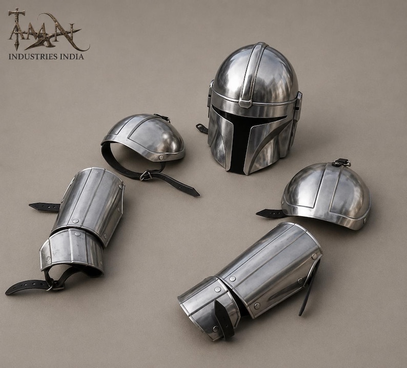 May include: A set of polished metal armor pieces, including a helmet, two shoulder caps, and two arm guards. The helmet has a T-shaped visor. The armor is silver in color and appears to be new.