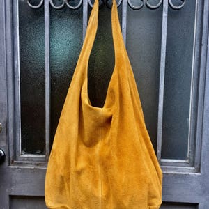 Yellow suede purse top