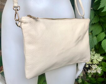 Small leather bag in CREAM WHITE. Crossbody / shoulder bag/ wristlet in GENUINE  leather. Adjustable strap and zipper. Broken white purse.