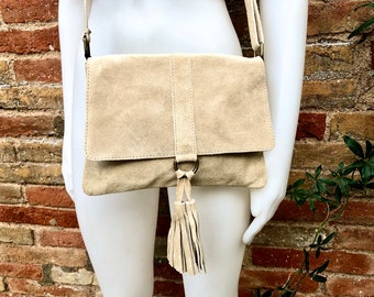 Cross body bag. BOHO suede leather bag in beige. Soft genuine suede leather. Crossover, messenger bag in suede. Small boho bag with tassel.