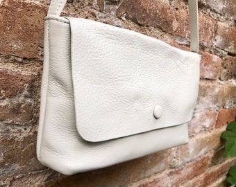 Small white leather bag. Genuine leather cross body / shoulder bag. Adjustable strap, zipper + flap. Small white leather purse.
