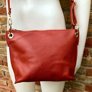Terracotta leather bag. Orange-brown cross body / shoulder bag. Genuine leather purse with adjustable strap and zipper. Soft leather bag