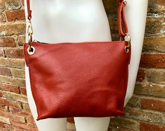 Terracotta leather bag. Orange-brown cross body / shoulder bag. Genuine leather purse with adjustable strap and zipper. Soft leather bag