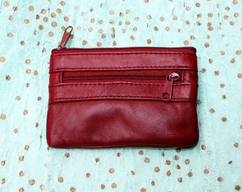 Small purse in genuine leather. Burgundy coin purse with  3 Zippers, fits credit cards, coins, bills. Small leather wallet