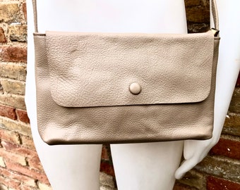 Small leather bag in dark beige. Genuine leather crossbody / shoulder bag. Light brown leather bag with adjustable strap,  zipper and flap.