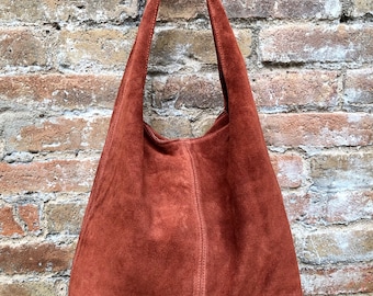 burnt orange leather handbolsas