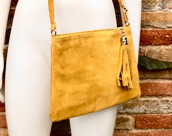 Mustard yellow suede leather bag. GENUINE  leather small crossbody / shoulder bag.Adjustable strap + zipper.Mustard yellow purse with tassel