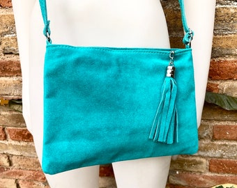 TURQUOISE suede leather bag. GENUINE  leather small crossbody / shoulder bag.Adjustable strap and zipper. Turquoise blue purse with tassel.