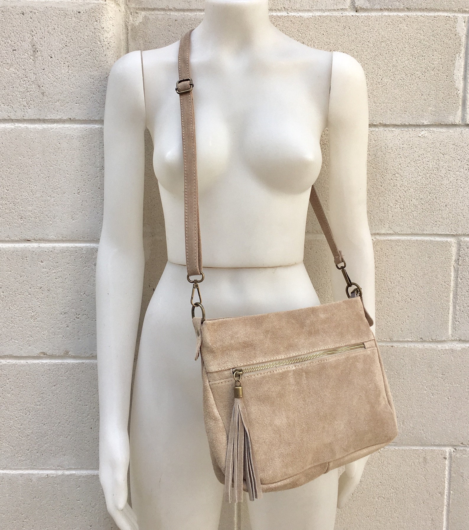 suede-leather-bag-in-beige-with-tassel-cross-body-bag-in-natural