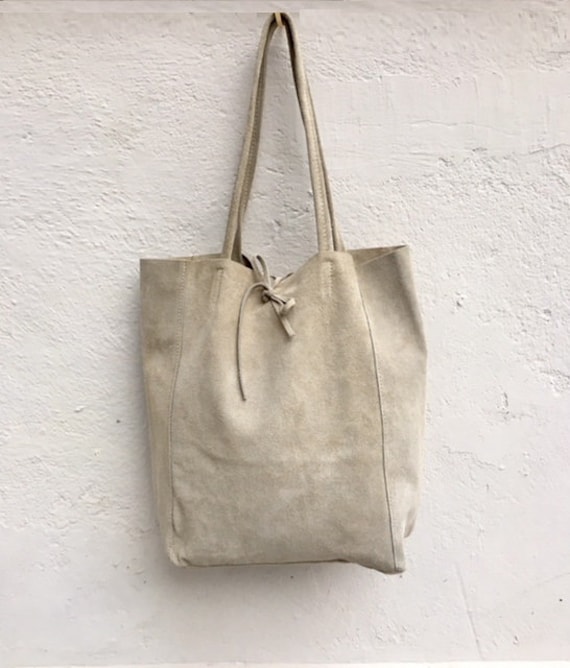 beige suede handbag