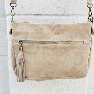 suede leather bag in BEIGE with tassel . Cross body bag in natural SUEDE. Messenger bags, bike bags, adjustable strap.