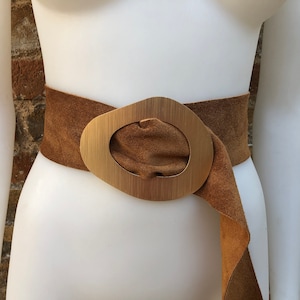 Camel brown suede waist belt with large metal buckle. Soft suede belt in light saddle brown. Boho suede belt. Genuine natural suede leather.