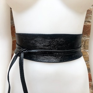 Black bi belt in soft leather. Wrap belt in metallic BLACK. Waist wraparound belt in black genuine leather. Boho black waist cinch belt.